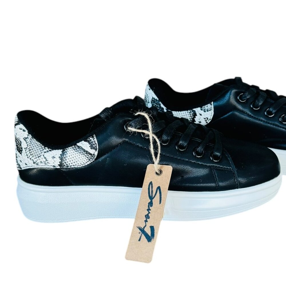 Seven7 Black with black and white snake skin on heel. Size 9
